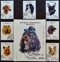 Набор почтовых марок (7 шт.) с блоком. "Собаки". 1991 год, Мадагаскар.