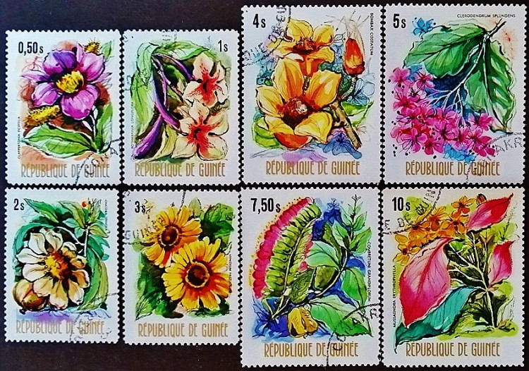 Набор почтовых марок (12 шт.). "Местные цветы". 1974 год, Гвинея.